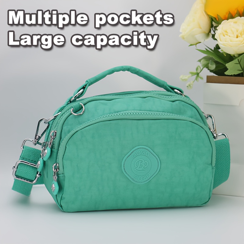 Party Games Switch - Bolsa crossbody feminina de nylon com
